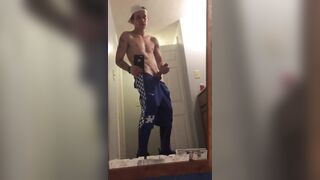 Sexy muscular dude jerks his big cock for his fans