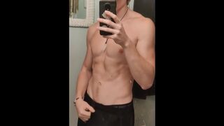 fit twink showing off in the mirror - 1 image