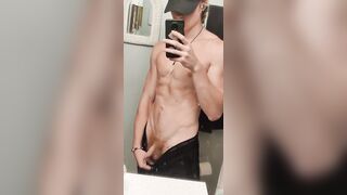 fit twink showing off in the mirror - 4 image