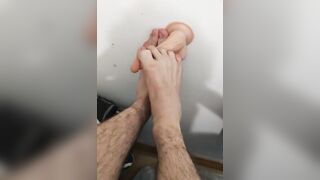 Horny teen with skinny hairy Legs masturbates and gives a footjob to his dildo - 8 image