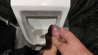 Precum and cumshot in public toilet - 1 image