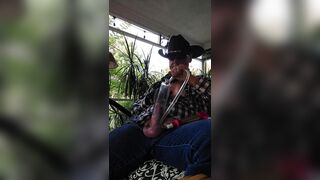 Cowboy dad pumps cock,and nips sitting on back porch - 5 image