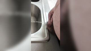 Chubby cub pissing in the sink - 9 image