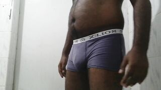 An Asian black boy pissing in his underwear - 4 image