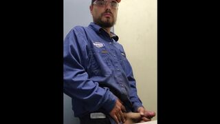 Blue collar worker strokes cock on the clock - 1 image