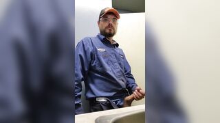 Blue collar worker strokes cock on the clock - 2 image