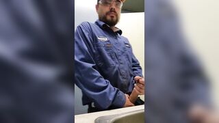 Blue collar worker strokes cock on the clock - 8 image