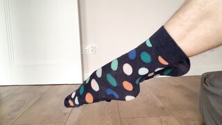 hot boy puts socks on his feet - 10 image
