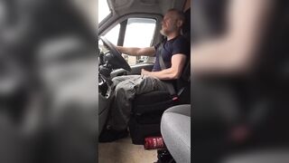 Muscular trucker jerks off and cums while driving - 2 image