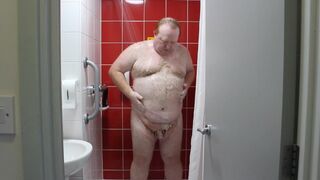 Daddy Bear Showering In Hotel - 1 image
