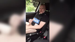 Muscular cop jerks off in police car beside busy road. - 10 image