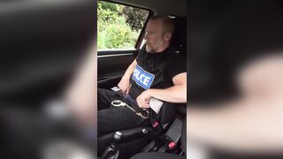 Muscular cop jerks off in police car beside busy road. - 3 image