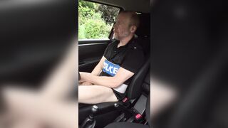 Muscular cop jerks off in police car beside busy road. - 4 image