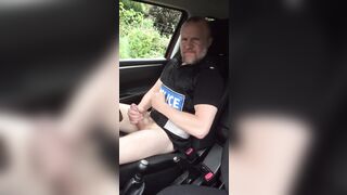 Muscular cop jerks off in police car beside busy road. - 6 image