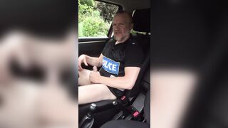 Muscular cop jerks off in police car beside busy road. - 9 image