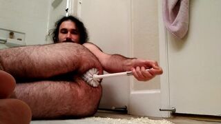 EXTREME toilet brush ass fuck: horny bear fucks own hungry hole with toilet brush all the way in - 1 image