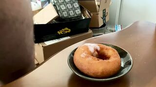 Glazing a hot doughnut - 1 image