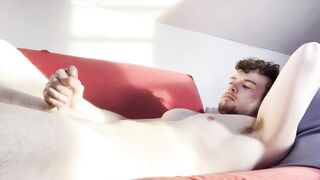 Solo male jerking his big cock on the couch - 9 image