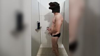 Godzilla After swim speedo wank in pool showers - 4 image