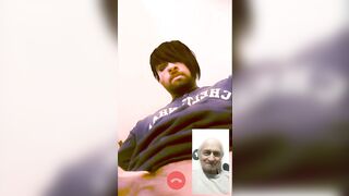 Old man and young boy having a video call fun - 2 image