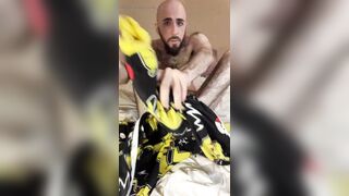 Bald bearded blue-eyed white otter in cute onesie pajamas strips down to tease very hairy ass with a gaming controller - 7 image