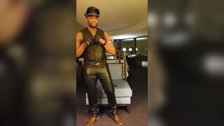 KennieJai strips and dances in leather - 3 image
