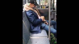 Jerking off in public on city bus with cumshot - 1 image