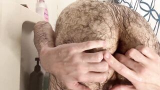 Showing off my very hairy white ass in the shower: spanking, washing, oiling, spreading, and fingering my virgin asshole - 9 image