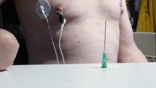 E-STIM in piercing tit and in tit with needle Pov - 2 image