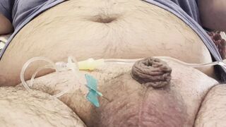 Inserting a large catheter into a small cock with big balls - 1 image