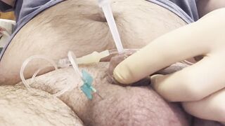Inserting a large catheter into a small cock with big balls - 4 image