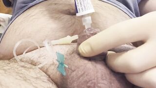 Inserting a large catheter into a small cock with big balls - 5 image