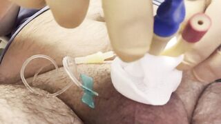 Inserting a large catheter into a small cock with big balls - 8 image