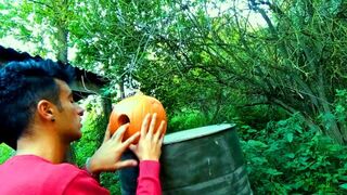 Twink is fucking a pumpkin and eating own creampie in the garden - 1 image