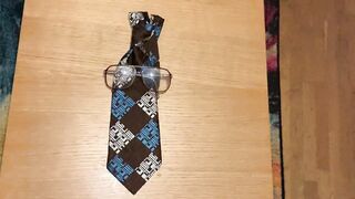 Cum on ugly glasses and ugly tie. - 3 image