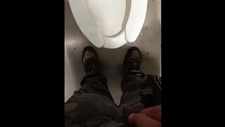 Peeing in a public bathroom - 1 image