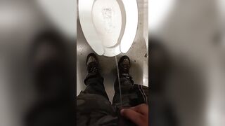 Peeing in a public bathroom - 2 image