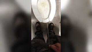 Peeing in a public bathroom