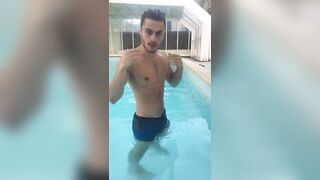 Blue wet boxers fine-looking young hot guy shows off at the pool - 4 image