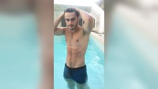 Blue wet boxers fine-looking young hot guy shows off at the pool - 7 image