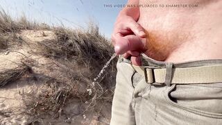 Big ginger cock pissing in the dunes at the beach and in a bar