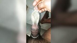 Pissing and drinking from condom used condom - 2 image