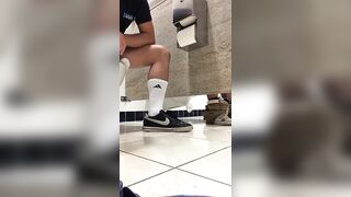 SUCKING COCK UNDER A MALL BATHROOM STALL - 1 image