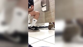 SUCKING COCK UNDER A MALL BATHROOM STALL - 2 image