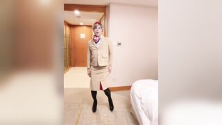 Asian sissy dancing and striping in Emirates cabin crew uniform - 3 image