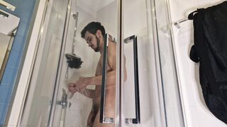 Flexing in the shower - 2 image