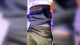 boy in tracksuit shows his underwear  - 1 image