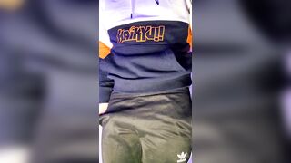 boy in tracksuit shows his underwear  - 2 image