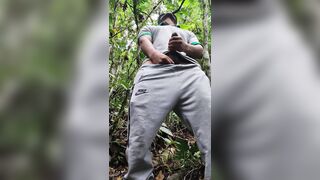 young handsome ranger masturbates and cums in the jungle, while he stays behind his companions