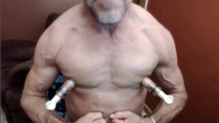 Gay Nipple Pig pumping up his giant nipples